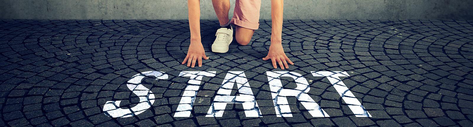 young man in the starting position