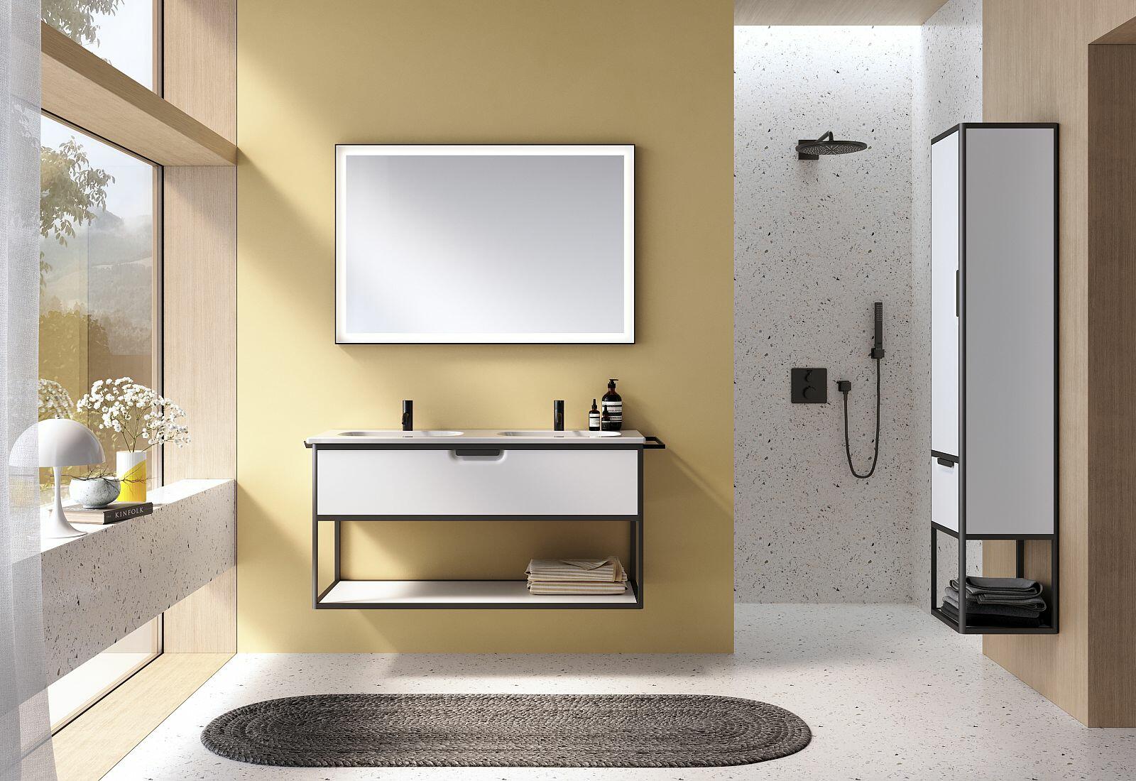 Hell-gelbes Badezimmer mit eine guten Mischung aus geschwungenen und eckigen Formen der Badmöbel-Serie vry von burgbad